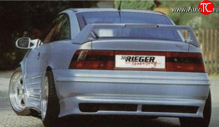 4 499 р. Накладка заднего бампера Rieger Opel Calibra A (1990-1997)  с доставкой в г. Краснодар