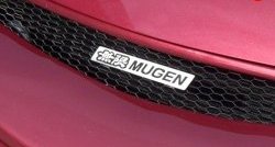 Эмблема (шильдик) решетки радиатора Mugen Renault Megane LA седан рестайлинг (1999-2003)