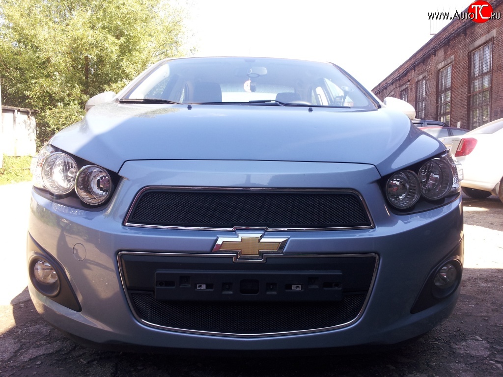 1 469 р. Нижняя сетка на бампер Russtal (черная)  Chevrolet Aveo  T300 (2011-2015) седан, хэтчбек  с доставкой в г. Краснодар