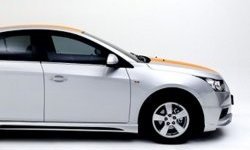 3 999 р. Накладка на передний бампер Extrime Chevrolet Cruze J305 хэтчбек дорестайлинг (2009-2012) (Неокрашенная)  с доставкой в г. Краснодар. Увеличить фотографию 2