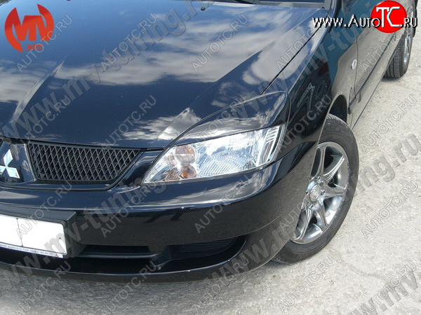 1 149 р. Реснички на фары var №2 (широкие)  Mitsubishi Lancer  9 (2003-2009) 1-ый рестайлинг седан, 1-ый рестайлинг универсал, 2-ой рестайлинг седан, 2-ой рестайлинг универсал (Неокрашенные)  с доставкой в г. Краснодар